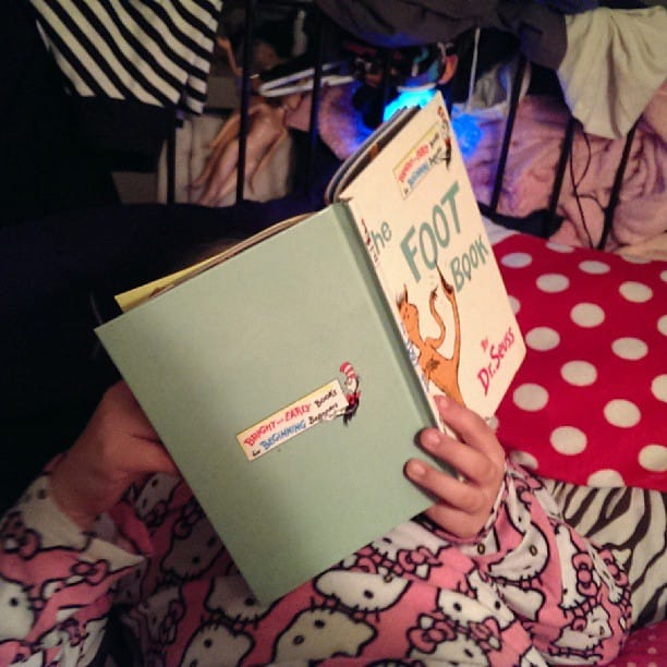 Reading The Foot Book to me before bed.