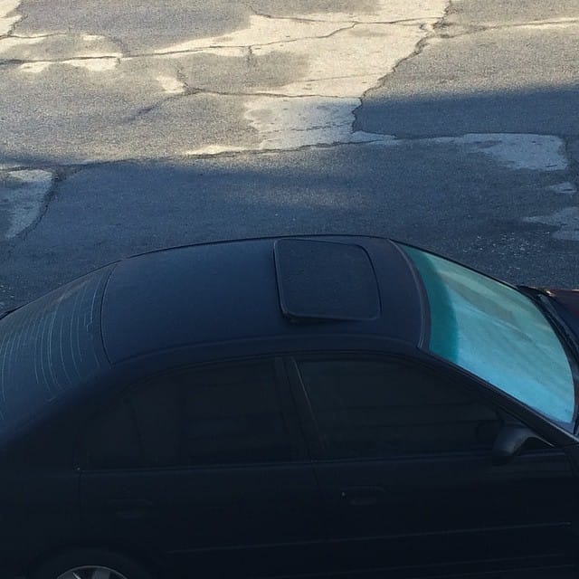 Well, someone's interior is going to be wet. #rain #moonroof Post image