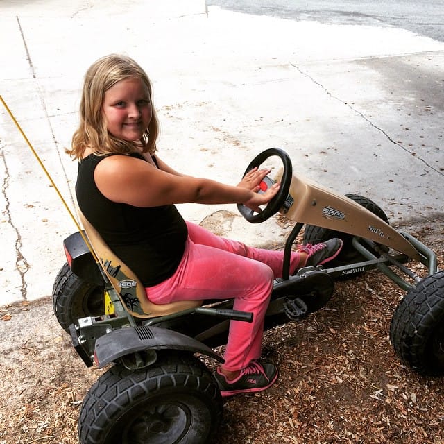 Jess riding a 4 wheeler at Post image