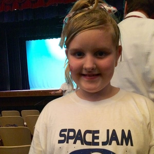 My lil girl about to perform in the school musical.