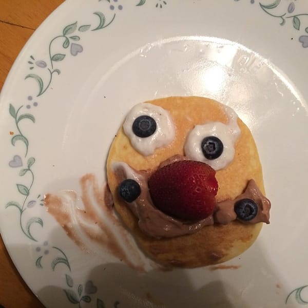 Jess made me a happy face pancake. I will "enjoy" it #365
