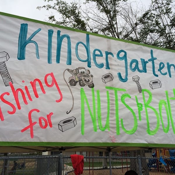 Cute sign for the Fishing for Nuts and Bolts booth at Family Fun Night