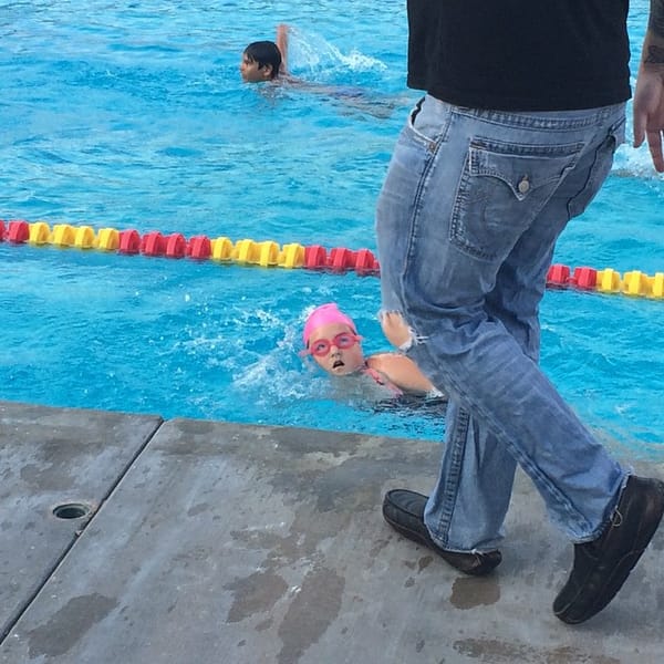 Watching my lil one get her swim on