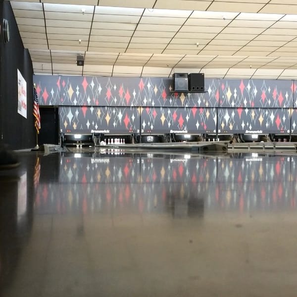 Daughter and dads Bowling