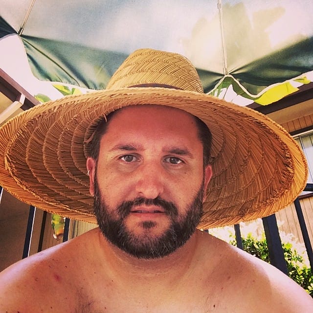 Silly hat but I don't get burnt in the pool. Feature image