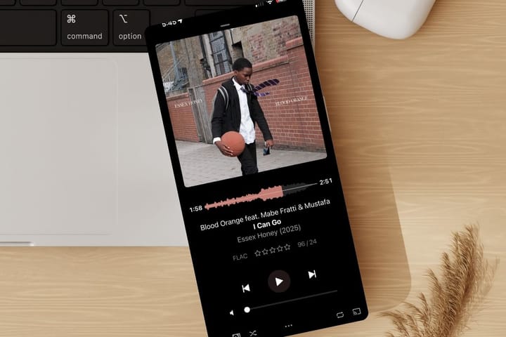 iPhone with PlexAmp running on it playing Blood Orange feat Mabe Fratti & Mustafa - I Can Go